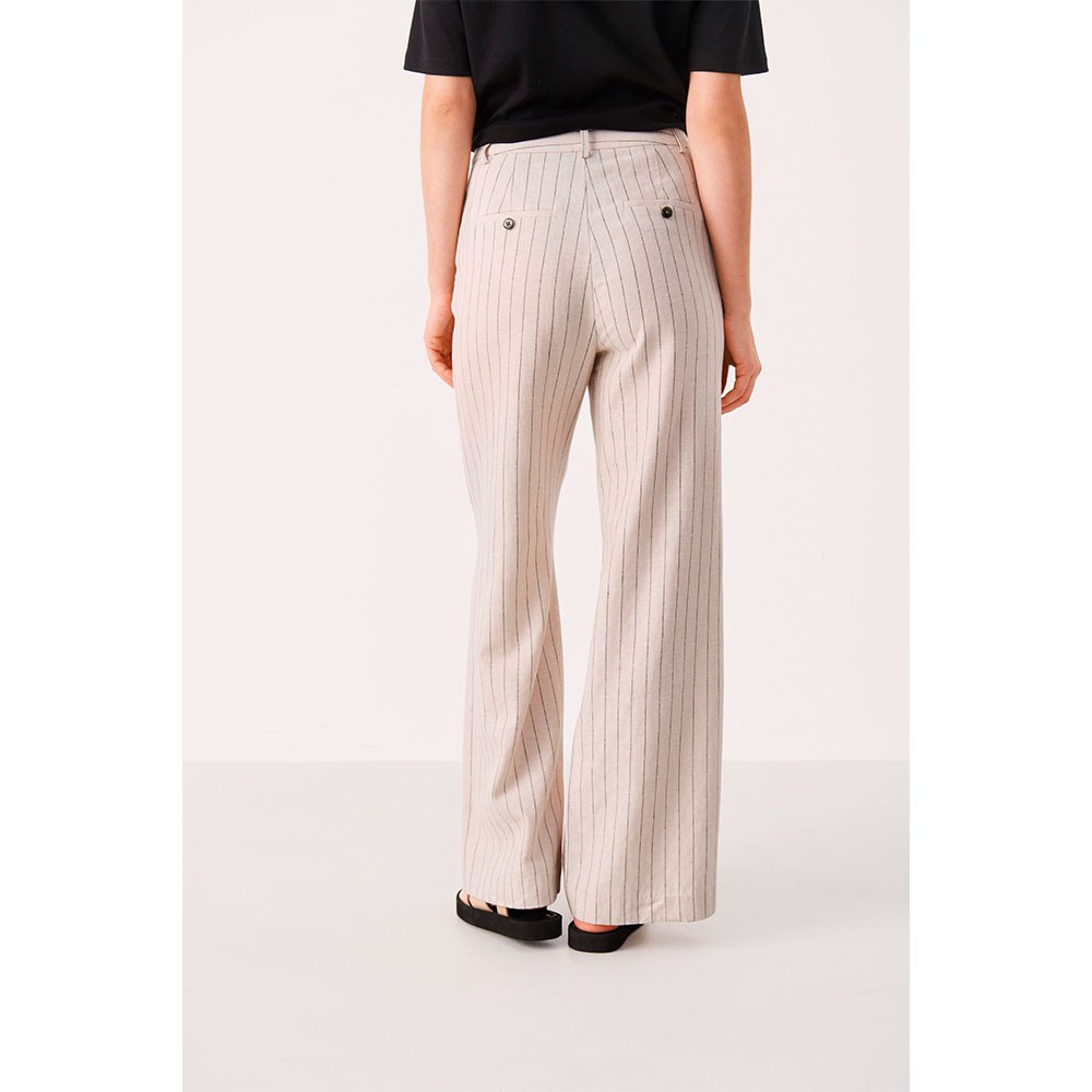 Pantalon blanco con rayas best sale negras mujer